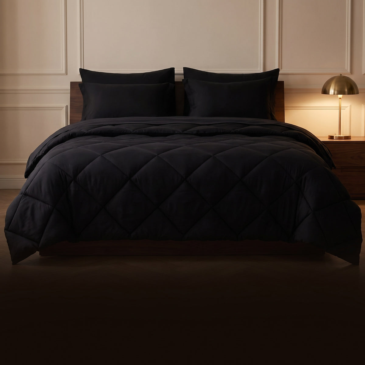 Made queen bed in Midnight, dim bedroom, warm lamp